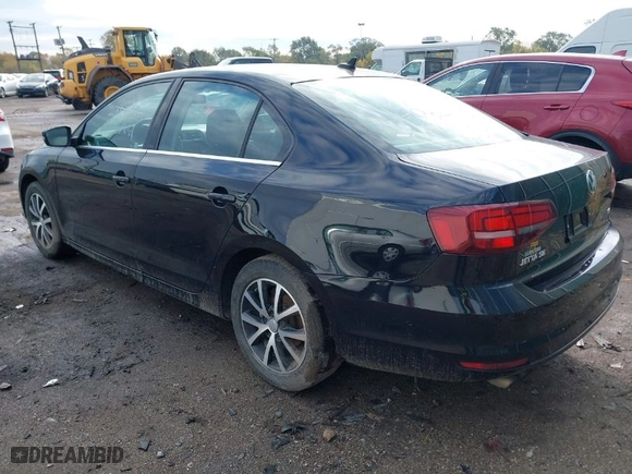 2018 Volkswagen Jetta 1.4T SE with VIN 3VWDB7AJ8JM240887, listed as a IAAI auction lot 40657661 with 76,568 mi miles. Bid and sale history available at carsss.com. Image 3.
