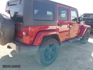 2011 Jeep Wrangler Unlimited Sahara with VIN 1J4BA5H15BL557871, listed as a IAAI auction lot 41922328 with 206,581 mi miles. Bid and sale history available at carsss.com. Image 4.