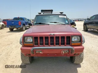 1999 Jeep Cherokee Sport с VIN 1J4FT68S5XL675839, выставлен на аукционе Copart как лот 65230005 с пробегом 204 102 миль миль и Списание • Salvage title. История ставок и продаж доступна на DreamBid. Изображение 5.