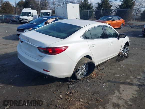2016 Mazda Mazda6 i Sport with VIN JM1GJ1U55G1484856, listed as a IAAI auction lot 41543599 with 78,486 mi miles. Bid and sale history available at carsss.com. Image 4.