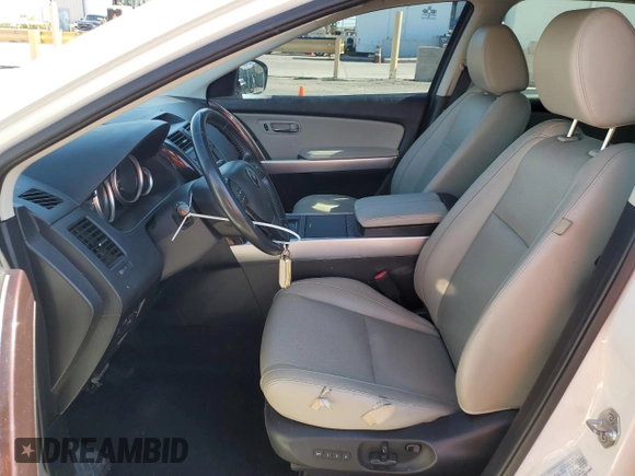 2014 Mazda CX-9 Grand Touring with VIN JM3TB3DA5E0431539, listed as a Copart auction lot 62418005 with 139,686 mi miles and Salvage title. Bid and sale history available at DreamBid. Image 7.