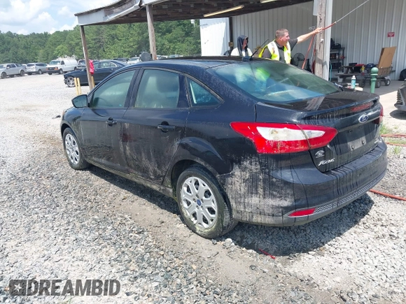 2012 Ford Focus SE with VIN 1FAHP3F21CL390012, listed as a IAAI auction lot 42634521 with 214,617 mi miles and . Bid and sale history available at DreamBid. Image 3.