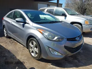2013 Hyundai Elantra Coupe GS with VIN KMHDH6AE6DU013174, listed as a IAAI auction lot 41771119 with 143,115 mi miles. Bid and sale history available at carsss.com. Image 1.