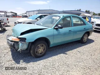 1999 Ford Escort LX with VIN 1FAFP10P6XW196483, listed as a Copart auction lot 59215635 with 74,859 mi miles and Salvage title. Bid and sale history available at DreamBid. Image 1.