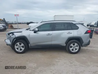 2020 Toyota RAV4 XLE with VIN 2T3W1RFV4LW094687, listed as a IAAI auction lot 42652039 with 56,693 mi miles and . Bid and sale history available at DreamBid. Image 14.
