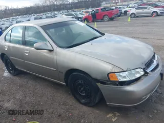 2001 Nissan Altima GXE with VIN 1N4DL01DX1C213778, listed as a IAAI auction lot 41230878 with 204,003 mi miles. Bid and sale history available at carsss.com. Image 1.