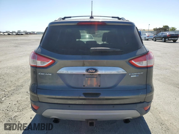 2015 Ford Escape Titanium with VIN 1FMCU9J99FUC13108, listed as a Copart auction lot 60815265 with 70,938 mi miles and Salvage title. Bid and sale history available at DreamBid. Image 6.