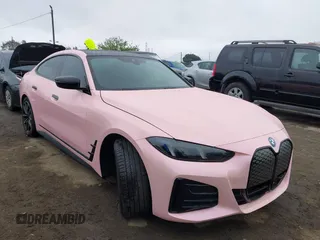 2025 BMW i4 eDrive40 z VIN WBY23HD05SFU38553, wystawiony jako IAAI lot #41919868 z przebiegiem 1 328 mil mil oraz . Historia ofert i sprzedaży dostępna na DreamBid. Obrazek 1.