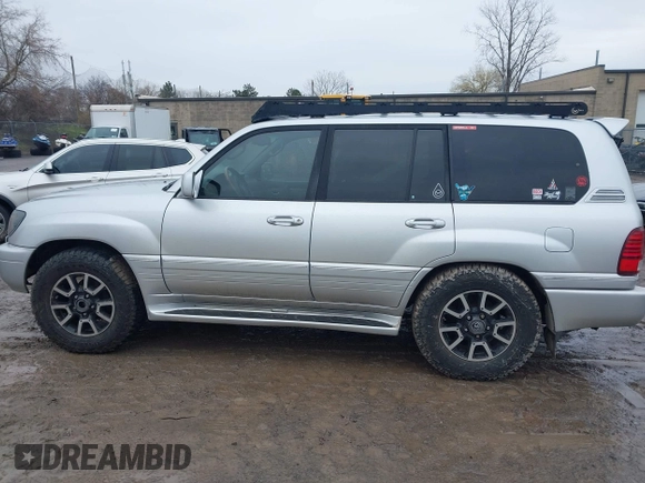 2006 Lexus LX 470 z VIN JTJHT00W364011426, wystawiony jako IAAI lot #42026869 z przebiegiem 254 659 mil mil oraz . Historia ofert i sprzedaży dostępna na DreamBid. Obrazek 14.