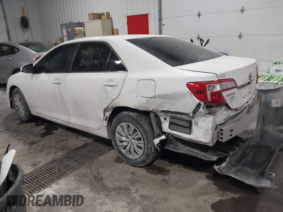 2014 Toyota Camry L with VIN 4T1BF1FK4EU763009, listed as a IAAI auction lot 41615134 with 165,293 mi miles and . Bid and sale history available at carsss.com. Image 6.