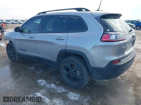 2021 Jeep Cherokee Altitude with VIN 1C4PJLLB6MD112830, listed as a IAAI auction lot 41560135 with 76,760 mi miles. Bid and sale history available at carsss.com. Image 3.