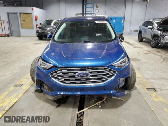 2021 Ford Edge Titanium with VIN 2FMPK4K98MBA18841, listed as a Copart auction lot 56207745 with 69,249 mi miles and Salvage title. Bid and sale history available at DreamBid. Image 5.