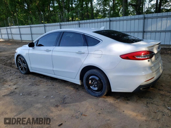 2020 Ford Fusion Titanium with VIN 3FA6P0D96LR152910, listed as a Copart auction lot 55389355 with 105,690 mi miles and Salvage title. Bid and sale history available at DreamBid. Image 2.