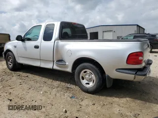 2000 Ford F-150 XL with VIN 1FTRX07W3YKA40036, listed as a Copart auction lot 51795085 with Not provided miles and Salvage title. Bid and sale history available at DreamBid. Image 2.