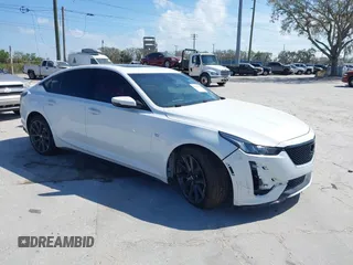 2021 Cadillac CT5 Sport z VIN 1G6DP5RK1M0108764, wystawiony jako IAAI lot #41609228 z przebiegiem 46 077 mil mil oraz . Historia ofert i sprzedaży dostępna na DreamBid. Obrazek 1.