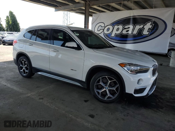2017 BMW X1 xDrive28i with VIN WBXHT3C35H5F73546, listed as a Copart auction lot 59544545 with 125,185 mi miles and Salvage title. Bid and sale history available at DreamBid. Image 4.