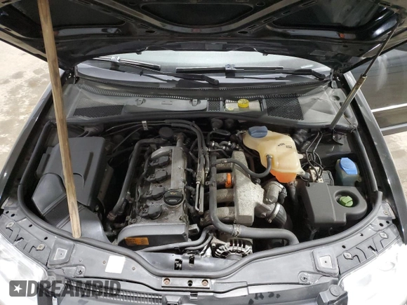2003 Volkswagen Passat GLS z VIN WVWPD63B33P244885, wystawiony jako Copart lot #41471955 z przebiegiem 147 198 mil mil oraz Szkoda całkowita • Salvage title. Historia ofert i sprzedaży dostępna na DreamBid. Obrazek 11.