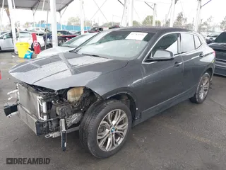 2018 BMW X2 sDrive28i with VIN WBXYJ3C33JEJ84879, listed as a IAAI auction lot 41783904 with 51,794 mi miles. Bid and sale history available at carsss.com. Image 2.