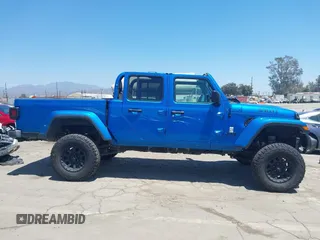 2022 Jeep Gladiator Texas Trail with VIN 1C6HJTAG4NL135346, listed as a IAAI auction lot 42824733 with 40,126 mi miles and . Bid and sale history available at DreamBid. Image 13.