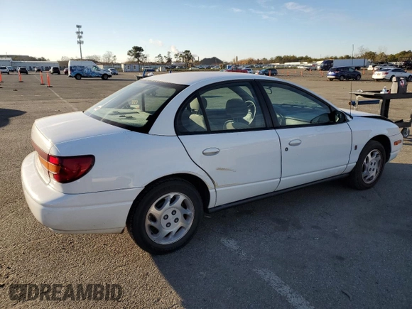 2001 Saturn SL z VIN 1G8ZK52771Z219294, wystawiony jako Copart lot #83155494 z przebiegiem 190 338 mil mil oraz Szkody całkowita. Historia ofert i sprzedaży dostępna na DreamBid. Obrazek 3.