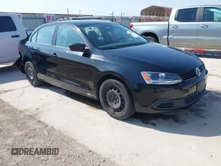 2014 Volkswagen Jetta Sedan S with VIN 3VW2K7AJ9EM386678, listed as a IAAI auction lot 41833784 with 98,390 mi miles. Bid and sale history available at carsss.com. Image 1.