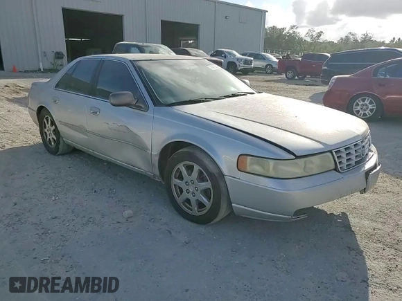 2003 Cadillac Seville Touring STS z VIN 1G6KY54923U101998, wystawiony jako Copart lot #74029304 z przebiegiem 134 157 mil mil oraz Szkoda całkowita • Salvage title. Historia ofert i sprzedaży dostępna na DreamBid. Obrazek 10.
