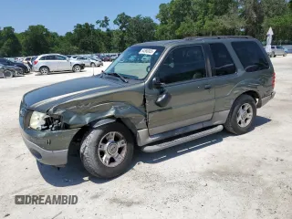 2003 Ford Explorer Sport XLS z VIN 1FMYU60E53UA78241, wystawiony jako Copart lot #54566005 z przebiegiem 187 731 mil mil oraz Szkody całkowita. Historia ofert i sprzedaży dostępna na DreamBid. Obrazek 1.