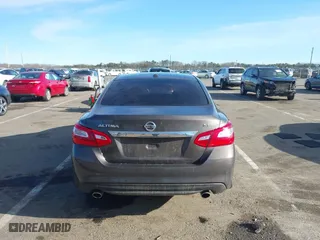 2017 Nissan Altima 2.5 SR with VIN 1N4AL3AP9HC133798, listed as a IAAI auction lot 41582890 with 57,440 mi miles. Bid and sale history available at carsss.com. Image 16.