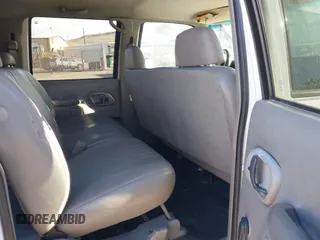1999 Chevrolet Suburban with VIN 3GNEC16R1XG208071, listed as a IAAI auction lot 41422385 with 152,692 mi miles. Bid and sale history available at carsss.com. Image 8.