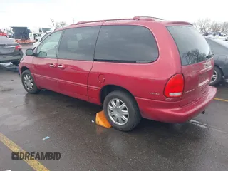1999 Chrysler Town & Country with VIN 1C4GT64L7XB723937, listed as a IAAI auction lot 41609957 with 242,800 mi miles and . Bid and sale history available at DreamBid. Image 3.