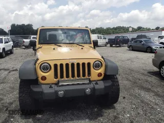 2013 Jeep Wrangler Sport with VIN 1C4AJWAG1DL672816, listed as a IAAI auction lot 42597238 with 105,910 mi miles and . Bid and sale history available at DreamBid. Image 12.