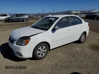 2010 Kia Rio with VIN KNADH4B34A6677878, listed as a Copart auction lot 76005074 with 89,404 mi miles and Salvage Title. Bid and sale history available at DreamBid. Image 1.