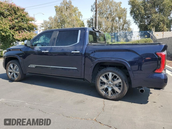 2023 Toyota Tundra Capstone Hybrid with VIN 5TFVC5DBXPX033319, listed as a Copart auction lot 73779344 with 9,723 mi miles and Salvage title. Bid and sale history available at DreamBid. Image 2.