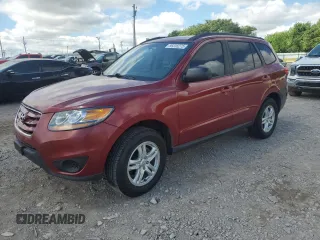 2011 Hyundai Santa Fe GLS z VIN 5XYZG3AB8BG011409, wystawiony jako Copart lot #56335275 z przebiegiem 191 575 mil mil oraz Czysty tytuł • Clean title. Historia ofert i sprzedaży dostępna na DreamBid. Obrazek 1.