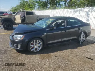 2014 Volkswagen Jetta GLI Edition 30 z VIN 3VW4S7AJ1EM311076, wystawiony jako Copart lot #55305175 z przebiegiem 70 785 mil mil oraz Szkoda całkowita • Salvage title. Historia ofert i sprzedaży dostępna na DreamBid. Obrazek 1.