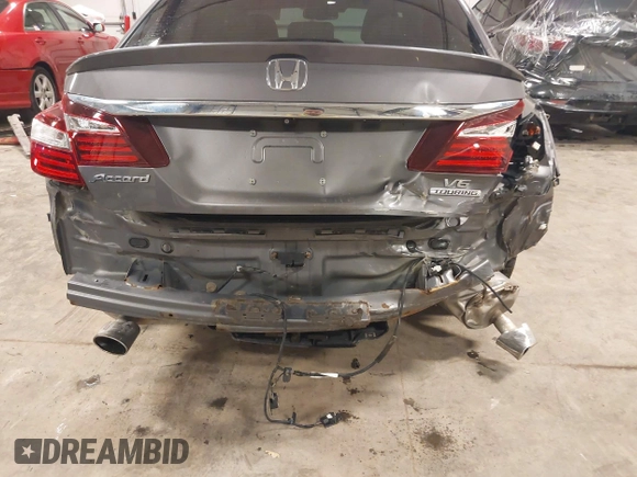 2016 Honda Accord Touring with VIN 1HGCR3F92GA029435, listed as a IAAI auction lot 42180794 with 132,658 mi miles and . Bid and sale history available at DreamBid. Image 21.