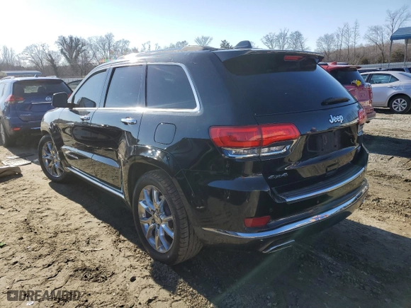 2014 Jeep Grand Cherokee Summit with VIN 1C4RJFJT4EC406899, listed as a Copart auction lot 42799245 with 168,575 mi miles and Salvage Title. Bid and sale history available at carsss.com. Image 2.