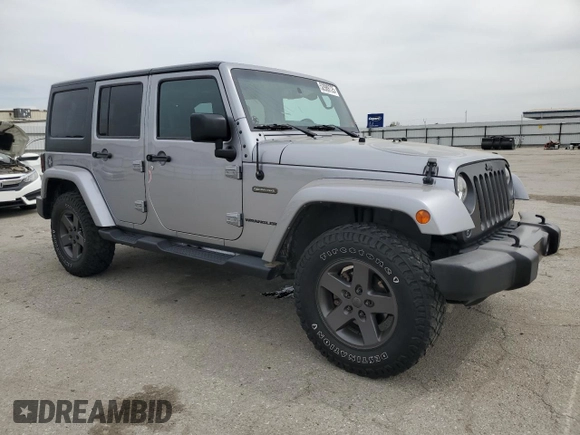 2016 Jeep Wrangler Unlimited Sport z VIN 1C4BJWDG5GL179046, wystawiony jako Copart lot #52989725 z przebiegiem 129 051 mil mil oraz Szkoda całkowita • Salvage title. Historia ofert i sprzedaży dostępna na DreamBid. Obrazek 4.