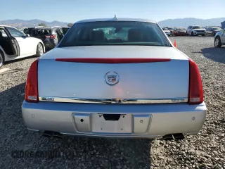 2009 Cadillac DTS 1SC z VIN 1G6KD57Y89U105190, wystawiony jako Copart lot #77560874 z przebiegiem 166 134 mil mil oraz Szkoda całkowita • Salvage title. Historia ofert i sprzedaży dostępna na DreamBid. Obrazek 6.
