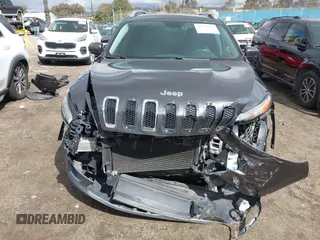 2016 Jeep Cherokee Limited with VIN 1C4PJLDS8GW233799, listed as a IAAI auction lot 41734376 with 114,187 mi miles. Bid and sale history available at carsss.com. Image 13.