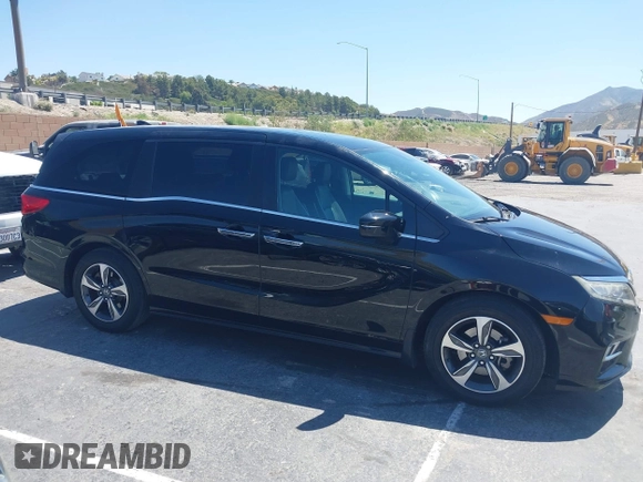 2018 Honda Odyssey Touring with VIN 5FNRL6H8XJB026247, listed as a IAAI auction lot 42298961 with 66,571 mi miles and . Bid and sale history available at DreamBid. Image 13.