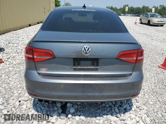 2015 Volkswagen Jetta SE with VIN 3VWD17AJ2FM323094, listed as a Copart auction lot 60304265 with 115,540 mi miles and Salvage title. Bid and sale history available at DreamBid. Image 6.