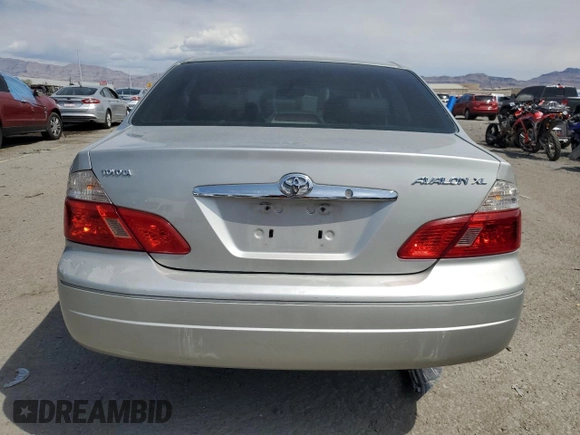 2004 Toyota Avalon XL z VIN 4T1BF28B14U377665, wystawiony jako Copart lot #55421495 z przebiegiem 174 323 mil mil oraz Szkoda całkowita • Salvage title. Historia ofert i sprzedaży dostępna na DreamBid. Obrazek 6.
