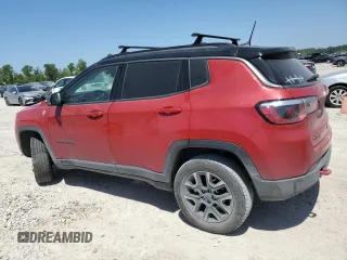 2020 Jeep Compass Trailhawk with VIN 3C4NJDDB6LT208185, listed as a Copart auction lot 56892265 with 90,924 mi miles and Salvage title. Bid and sale history available at DreamBid. Image 2.
