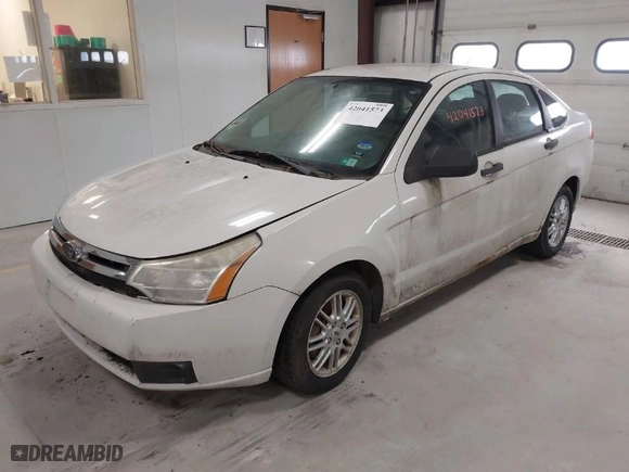 2009 Ford Focus SE with VIN 1FAHP35N59W180791, listed as a IAAI auction lot 42041573 with 201,464 mi miles. Bid and sale history available at carsss.com. Image 2.