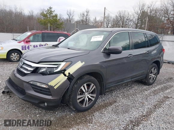 2017 Honda Pilot EX-L with VIN 5FNYF6H59HB029160, listed as a IAAI auction lot 41557192 with 157,153 mi miles and . Bid and sale history available at DreamBid. Image 18.