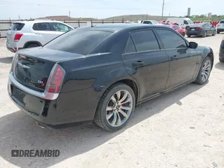 2014 Chrysler 300 S with VIN 2C3CCABG8EH376795, listed as a IAAI auction lot 42038260 with 134,265 mi miles and . Bid and sale history available at carsss.com. Image 4.