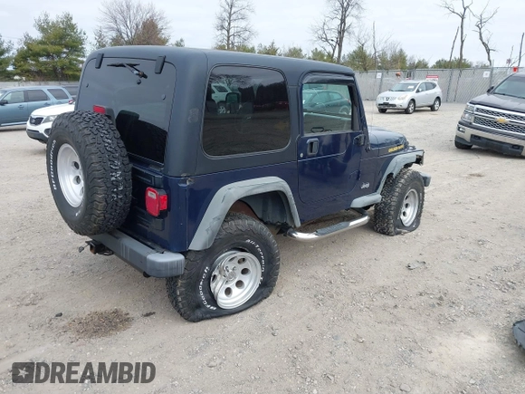 2006 Jeep Wrangler Sport with VIN 1J4FA49S16P737060, listed as a IAAI auction lot 41784197 with 42,030 mi miles. Bid and sale history available at carsss.com. Image 4.