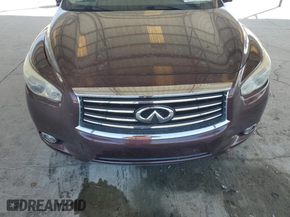 2013 Infiniti JX35 with VIN 5N1AL0MM9DC337002, listed as a Copart auction lot 51002775 with 128,836 mi miles and Salvage Title. Bid and sale history available at carsss.com. Image 14.