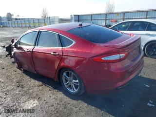 2015 Ford Fusion Titanium Hybrid with VIN 3FA6P0RU2FR199207, listed as a IAAI auction lot 41331947 with 1 mi miles. Bid and sale history available at carsss.com. Image 3.